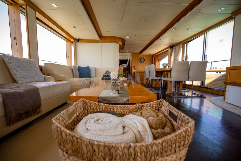 Sunseeker 90 yacht charter La Paz - main salon and helm photo 03