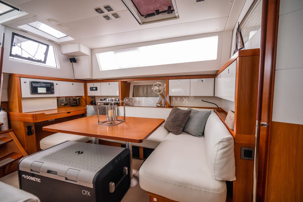 Beneteau 58 yacht charter La Paz - main salon and galley photo 04