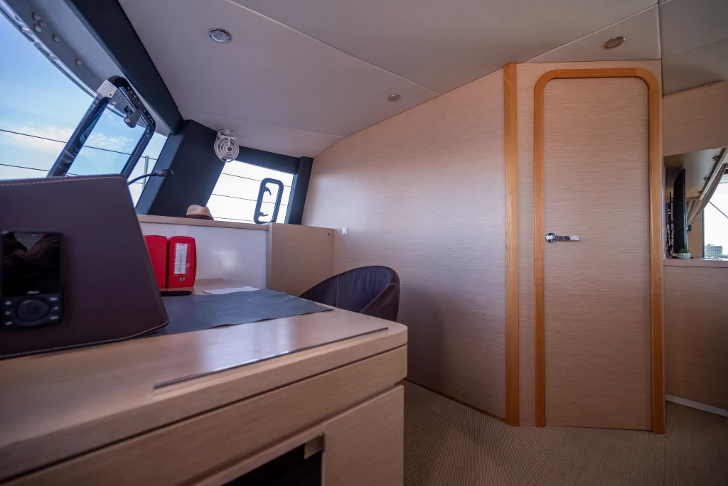 Neel 51 yacht charter La Paz - main salon and galley photo 04