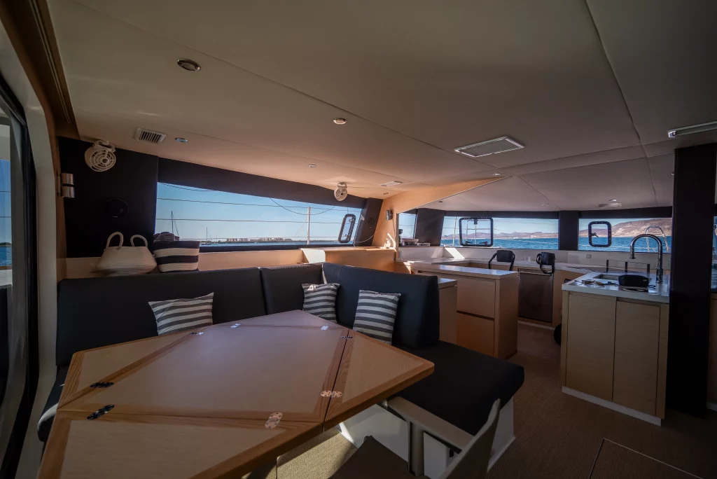 Neel 51 yacht charter La Paz - main salon and galley photo 05