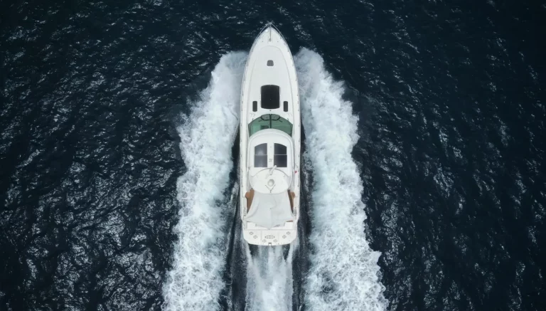 Sea Ray 65 yacht cruising the calm fall waters of Cabo San Lucas