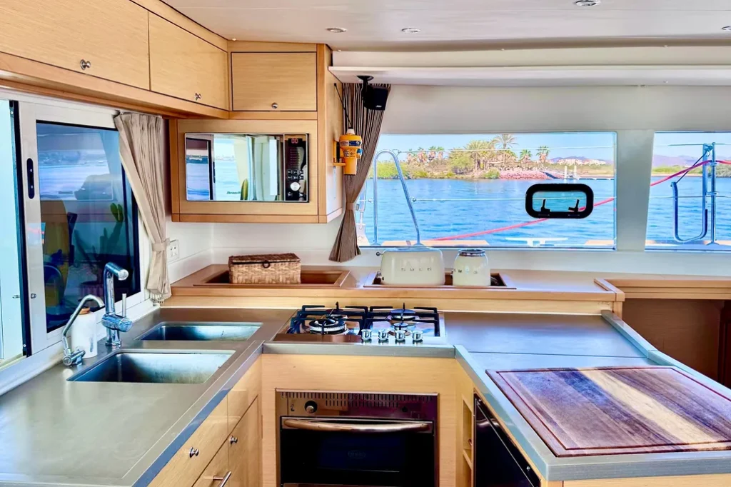 Lagoon 45 yacht charter La Paz - main salon and galley photo 05