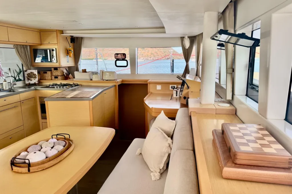 Lagoon 45 yacht charter La Paz - main salon and galley photo 03
