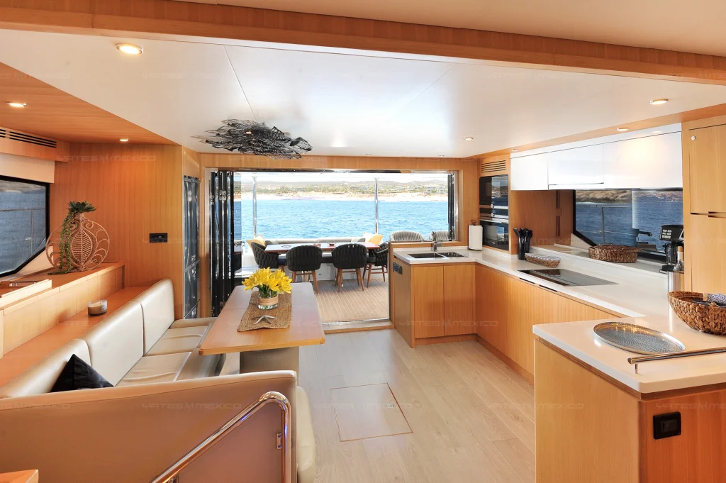 Iliad 60 yacht charter Cabo San Lucas - main salon and galley photo 01