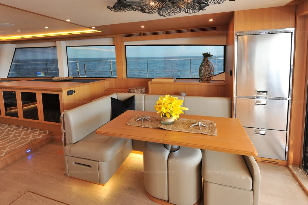 Iliad 60 yacht charter Cabo San Lucas - main salon and galley photo 04