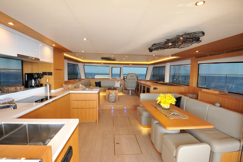Iliad 60 yacht charter Cabo San Lucas - main salon and galley photo 05