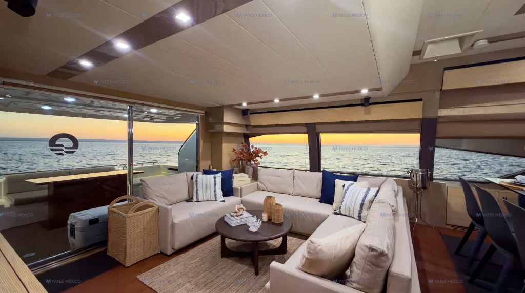 Ferretti 75 yacht charter La Paz - open salon with sunset light through the aft doors