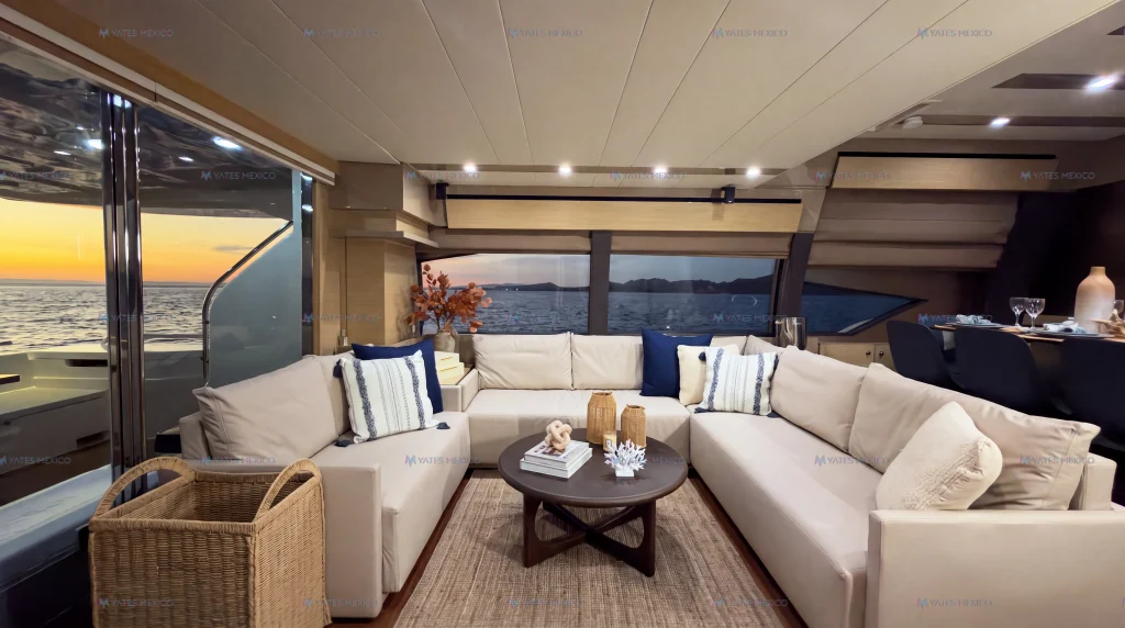 Ferretti 75 yacht charter La Paz - salon seating area with L-shaped sofa and sea views