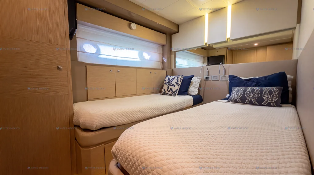 Ferretti 75 yacht charter La Paz - twin guest cabin with side portholes