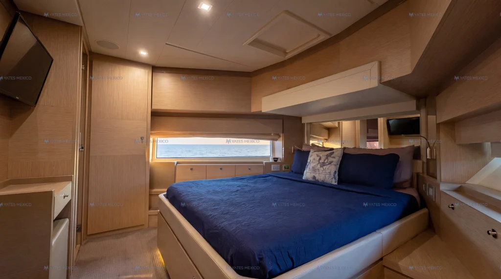 Ferretti 75 yacht charter La Paz - guest cabin with king bed, TV and en-suite head