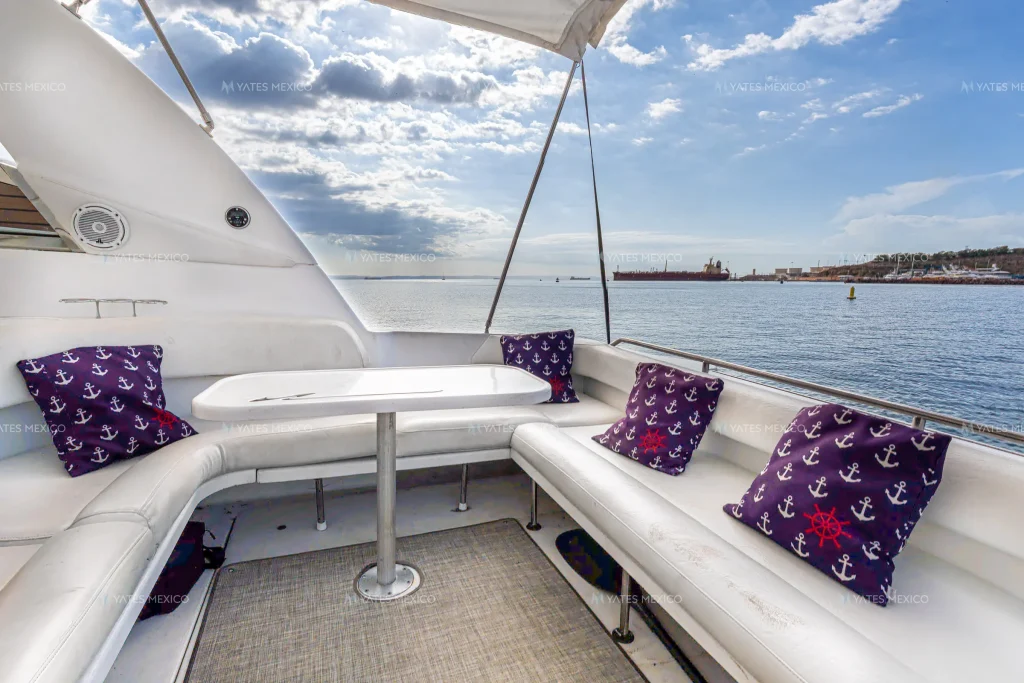 Sea Ray 45 yacht charter La Paz - shaded cockpit with wraparound seating and dining table