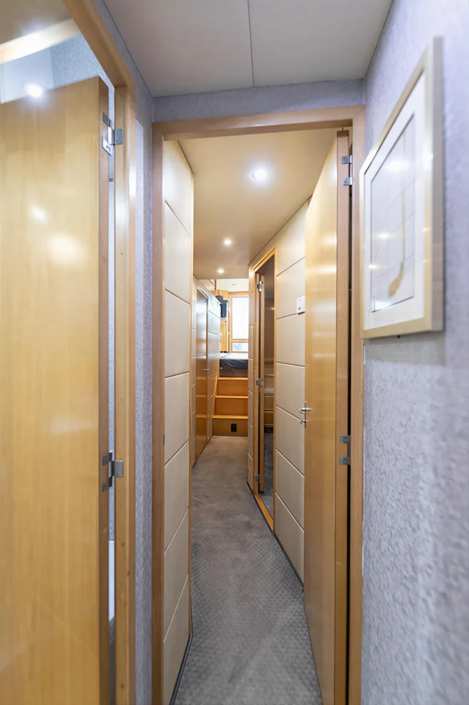Bertram 54 yacht charter La Paz - companionway leading to the staterooms