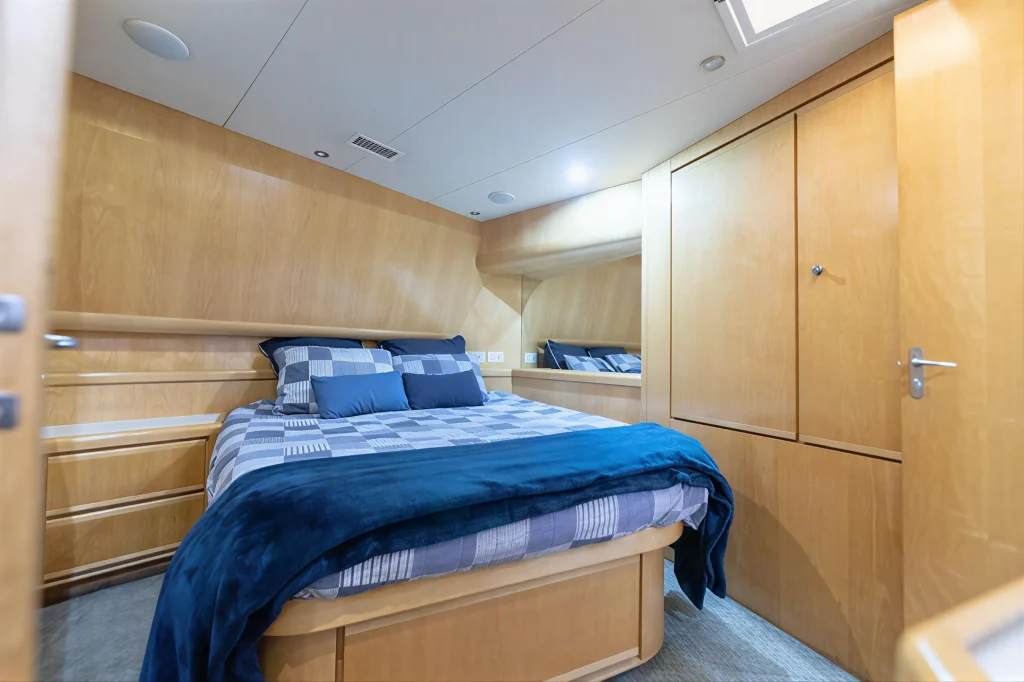 Bertram 54 yacht charter La Paz - midship master suite with queen berth