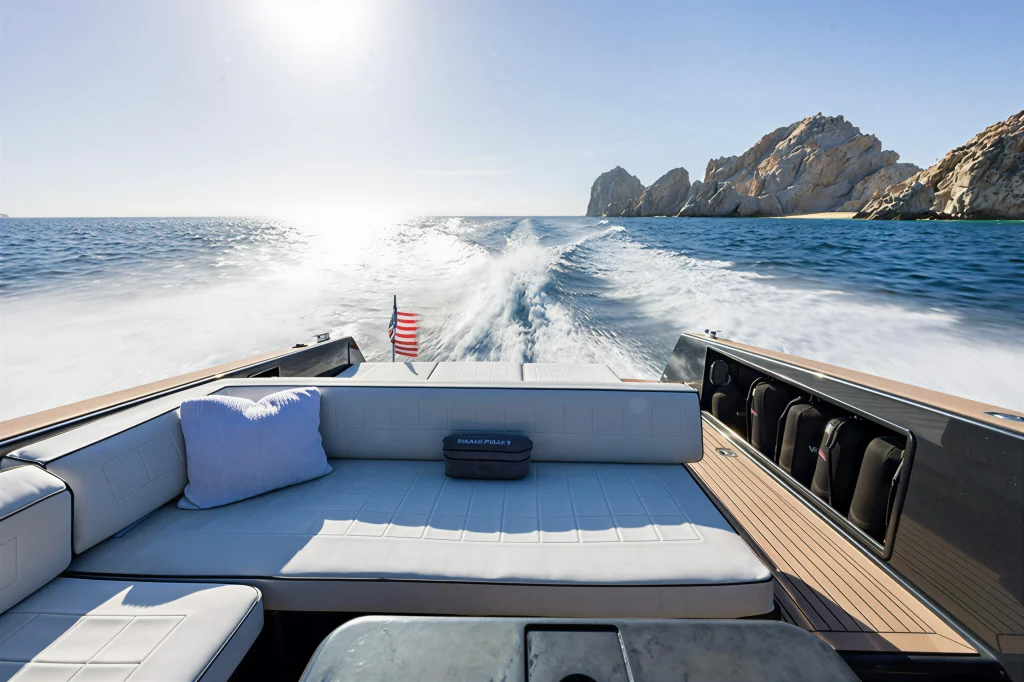 View from the bow of the VanDutch 42 with the wake and El Arco behind
