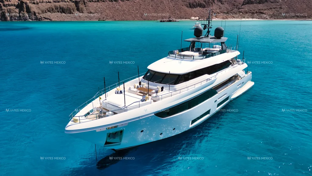 Custom Line 110 yacht charter La Paz - aerial profile at anchor in turquoise water