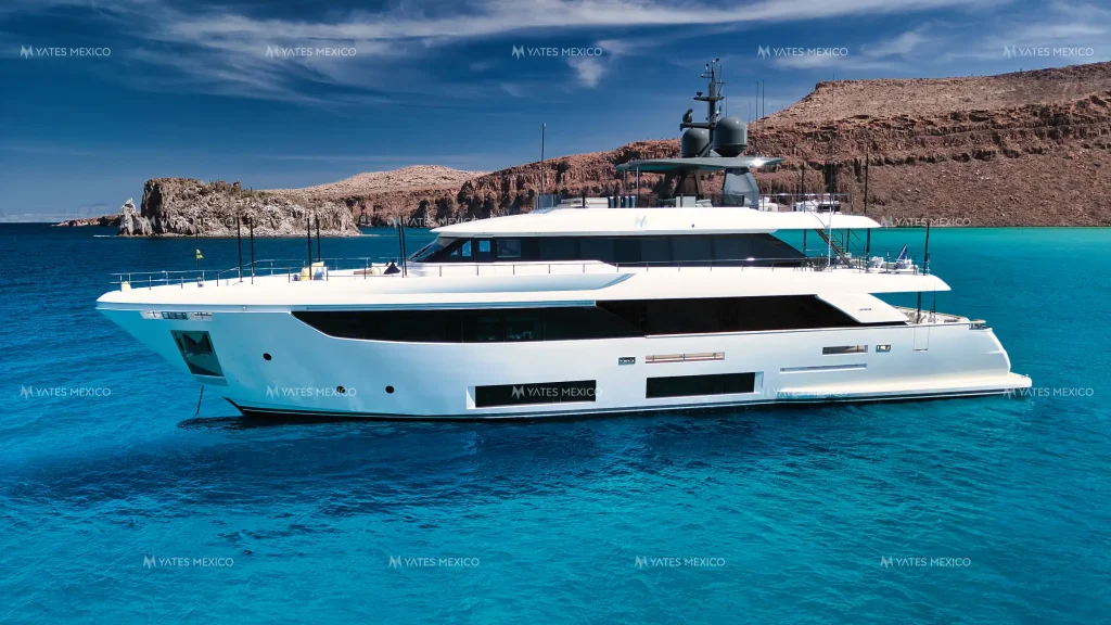 Custom Line 110 yacht charter La Paz - full-beam profile at anchor in the bay