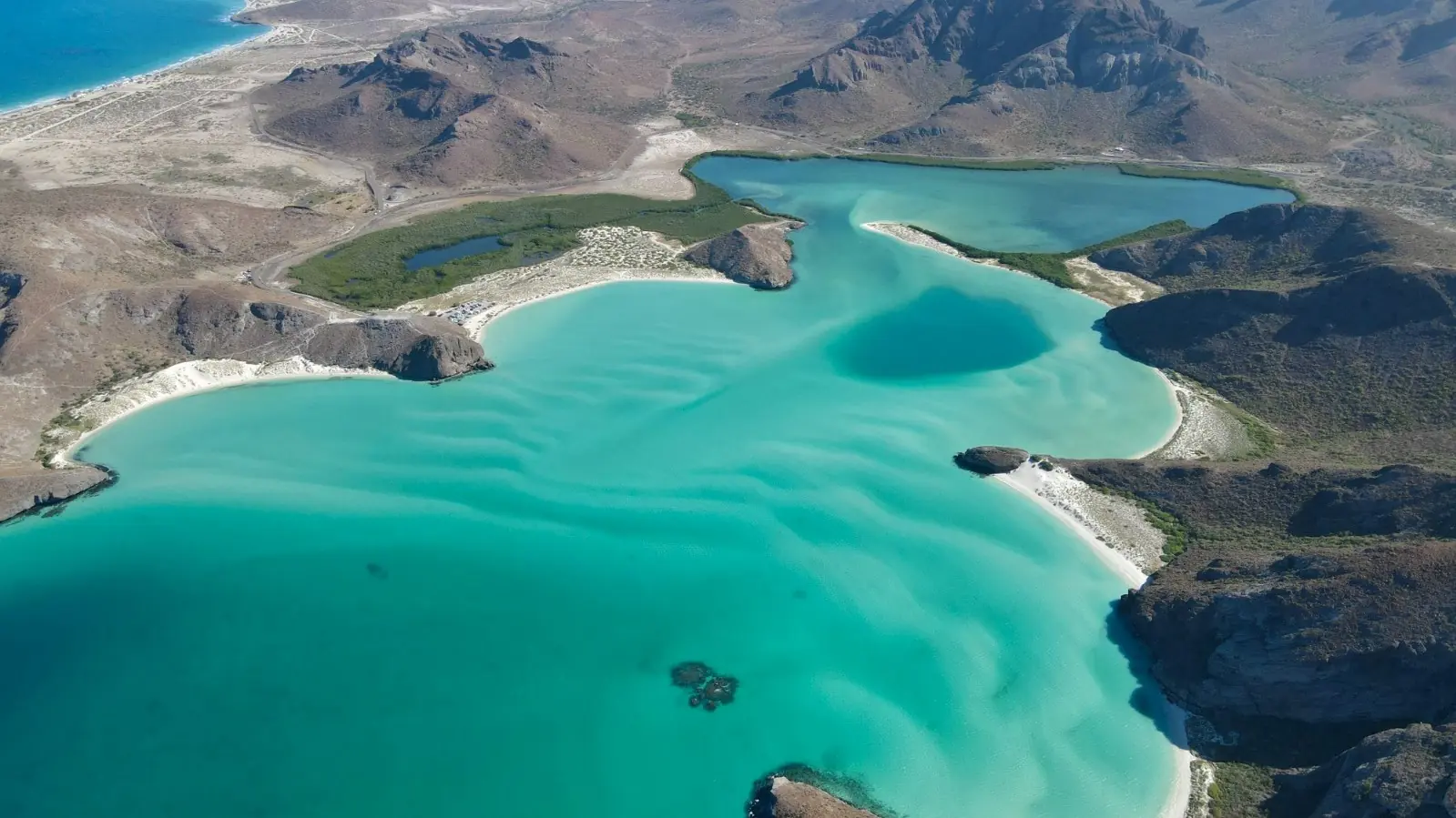 Honeymoon Package 18 Aerial view of Balandra Bay pale green lagoon near La Paz Baja California Sur