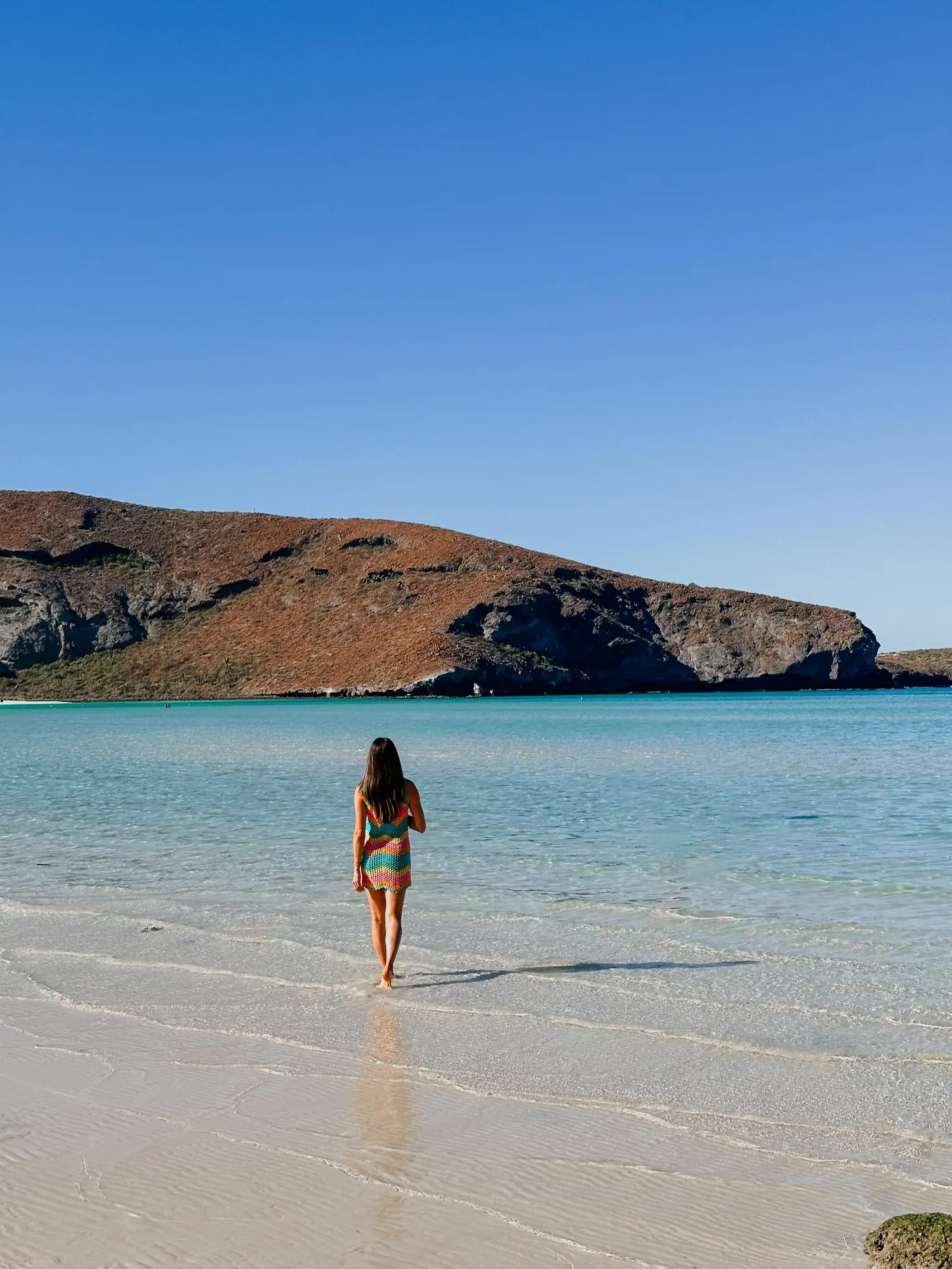 Honeymoon Package 19 Empty white sand beach and clear shallow water on an island near La Paz
