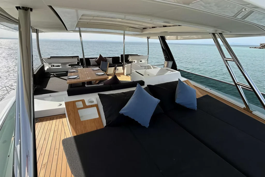 Shaded flybridge lounge and dining area aboard the Lagoon 63 in the Sea of Cortez