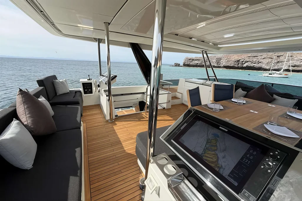 Flybridge helm station and seating on the Lagoon 63 charter catamaran