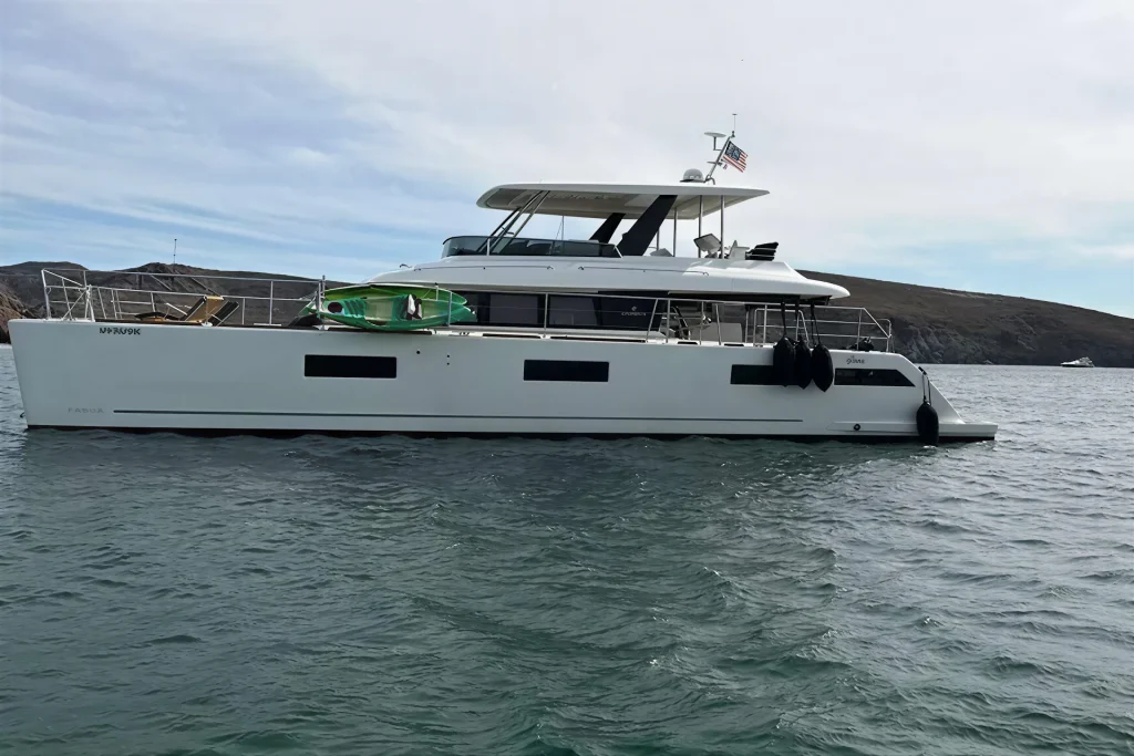 Lagoon 63 luxury charter catamaran anchored in a cove near La Paz