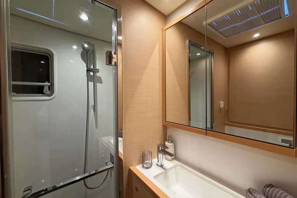 En-suite bathroom with glass shower on the Lagoon 63 catamaran, La Paz