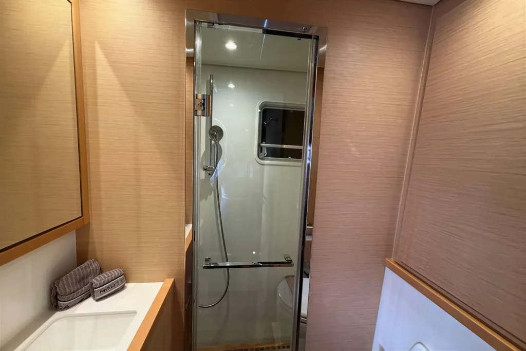 Private shower stall in an en-suite head on the Lagoon 63 catamaran