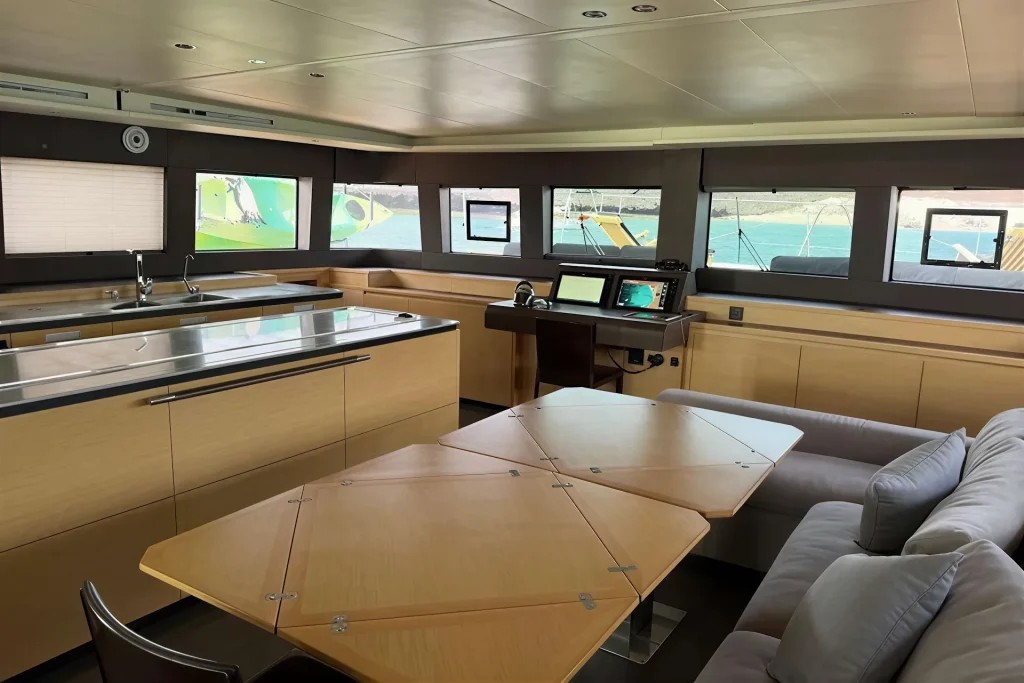 Salon dinette and navigation station aboard the Lagoon 63 catamaran