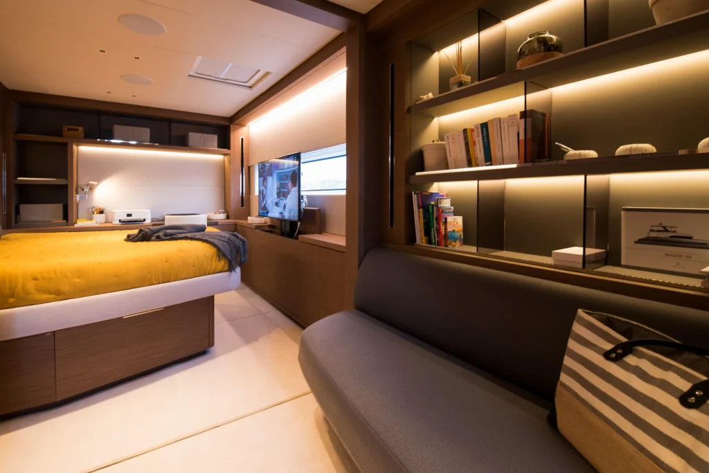 Owner suite with lounge seating and desk on the Lagoon 67