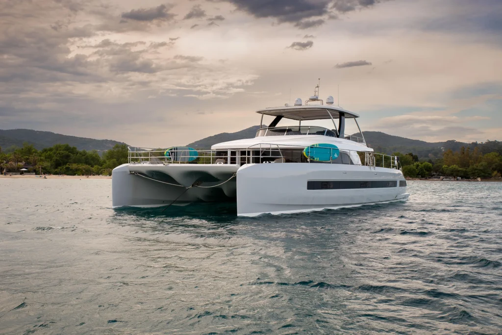 Stern quarter view of the Lagoon 67 charter catamaran under way