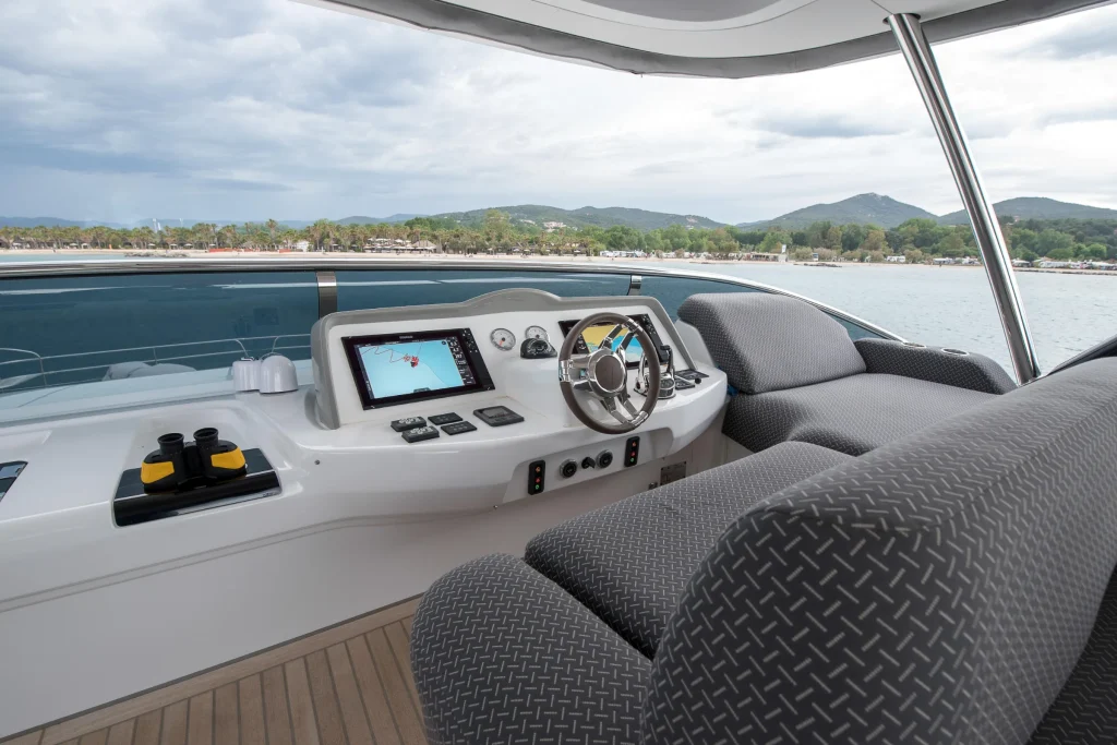 Upper helm seat and controls on the Lagoon 67 flybridge