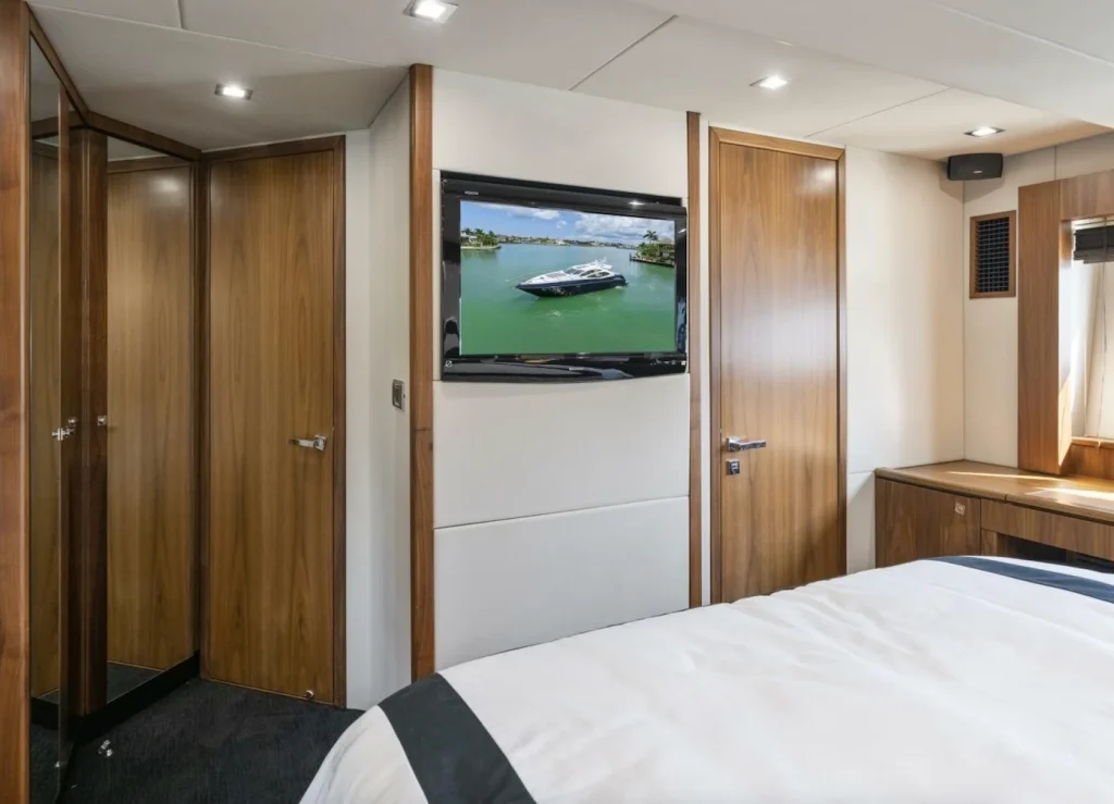 Sunseeker 64 yacht charter La Paz - cabin with TV and en-suite door