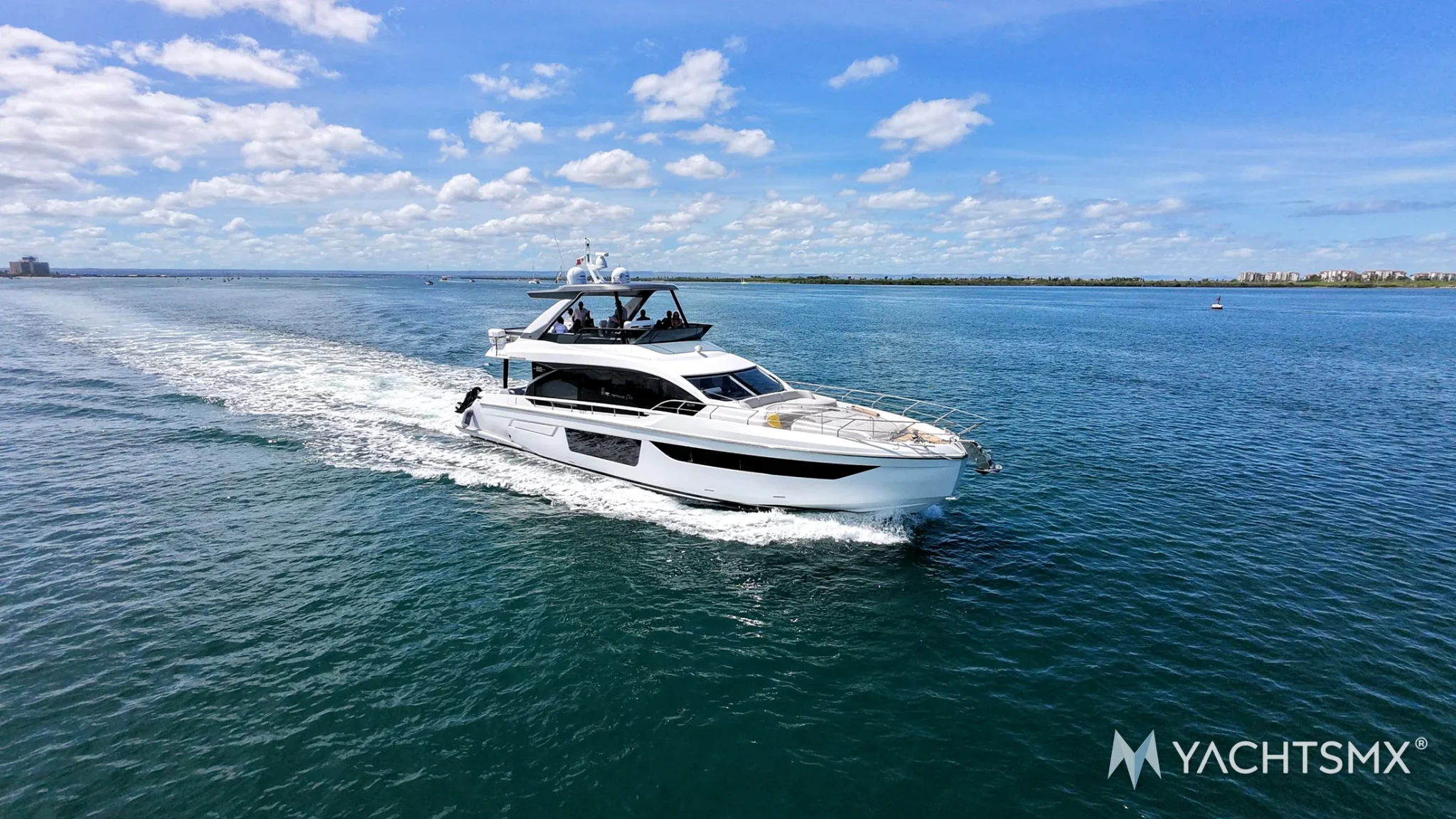 Azimut 68 2023 yacht charter La Paz - running through the bay - exclusive with YACHTSMX